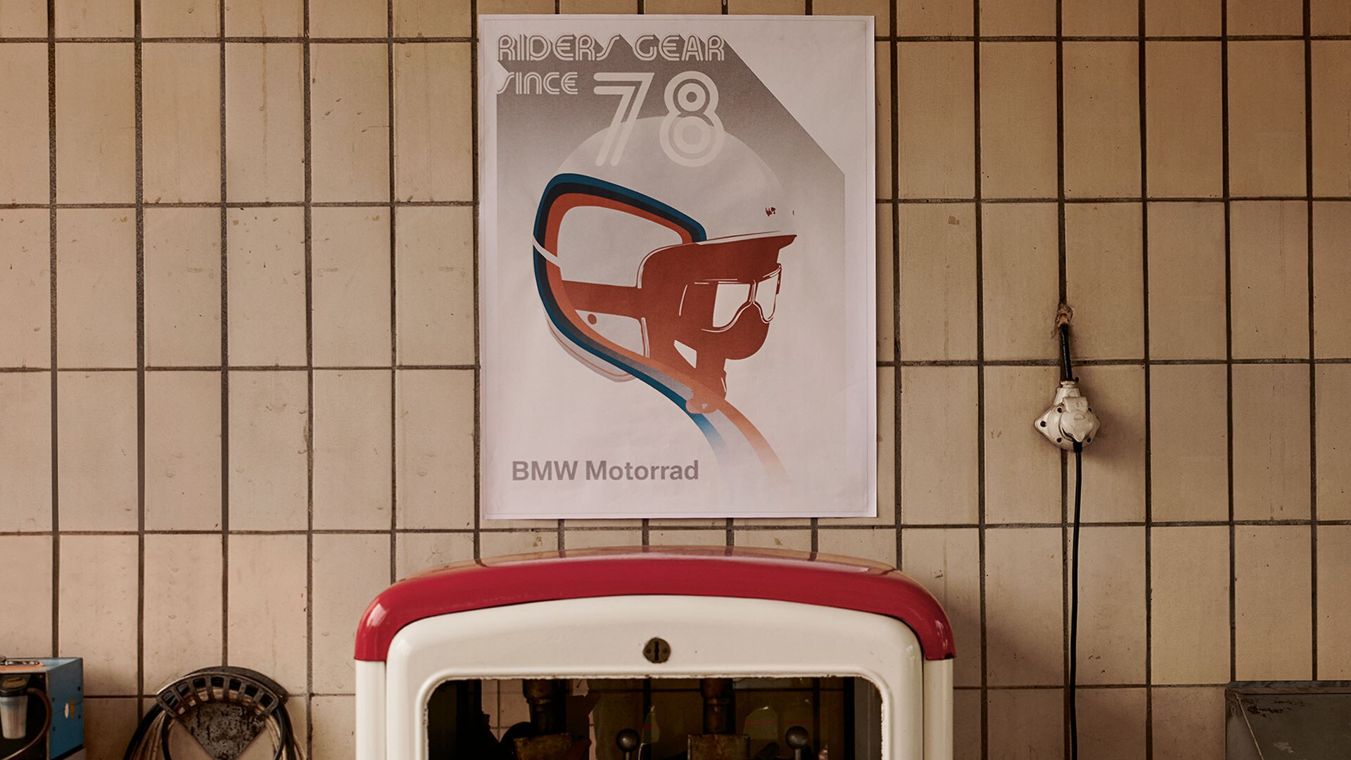 Poster “40 Ans“ Edition Limiteé hanging on the garage wall